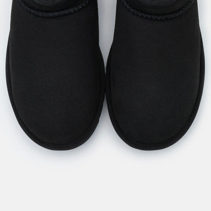 UGG Classic Ultra Mini Black bottines fourrées femme en daim et peau de mouton noir, détail intérieur
