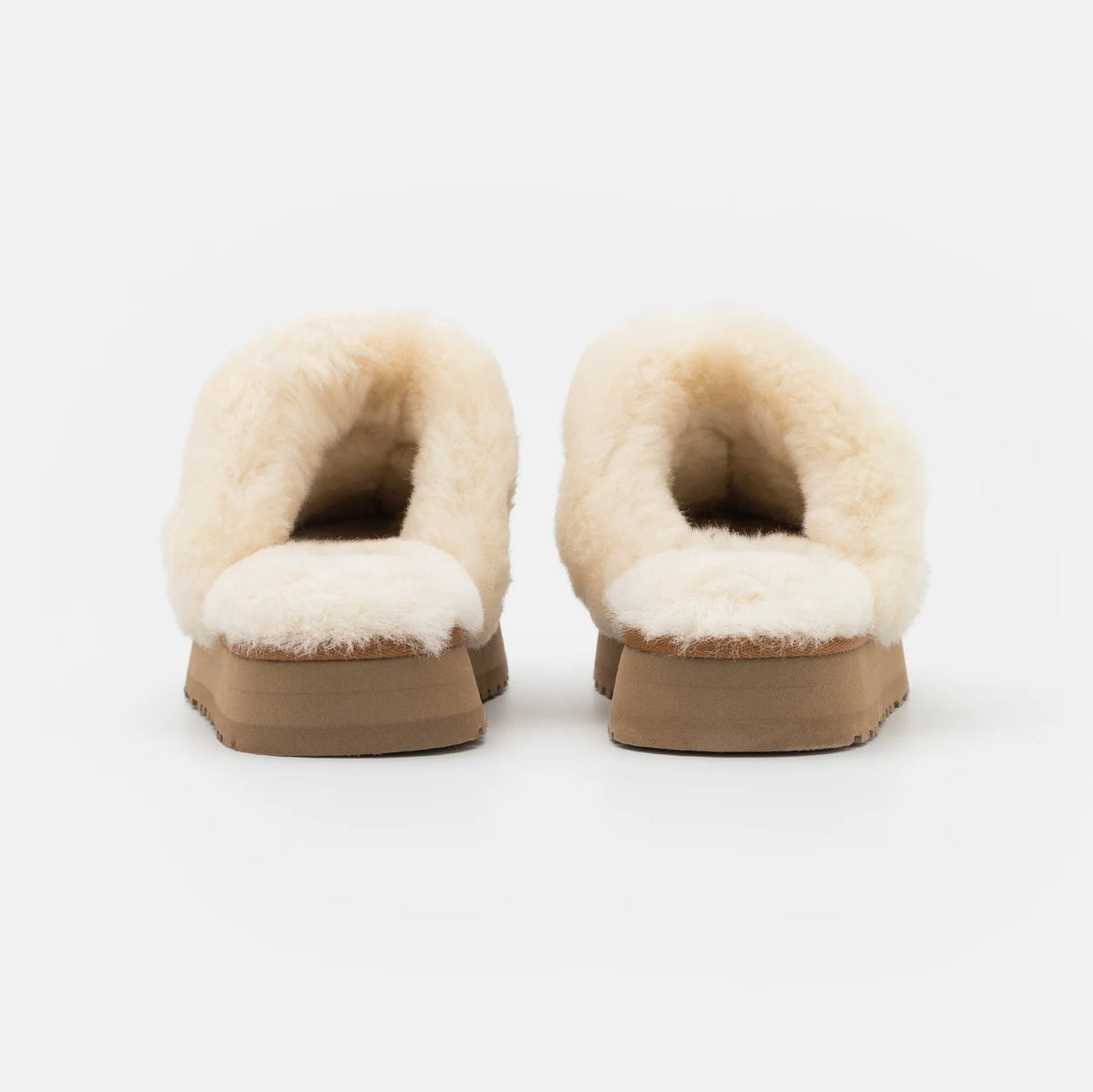 UGG Disquette Chestnut sabots fourrés femme en daim et peau de mouton marron chestnut, détail semelle