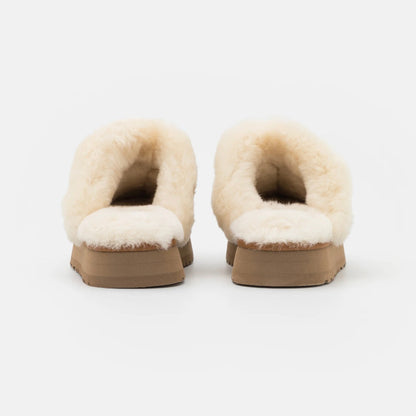 UGG Disquette Chestnut sabots fourrés femme en daim et peau de mouton marron chestnut, détail semelle