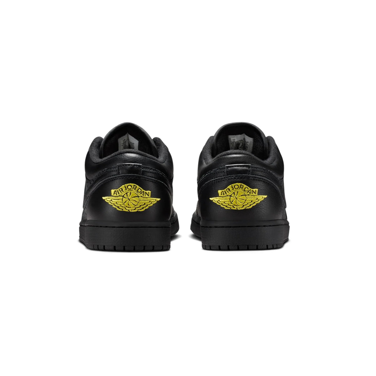 Air Jordan 1 Low Black Elephant Print baskets basses homme et femme en cuir noir, détail semelle