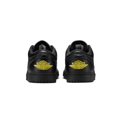 Air Jordan 1 Low Black Elephant Print baskets basses homme et femme en cuir noir, détail semelle