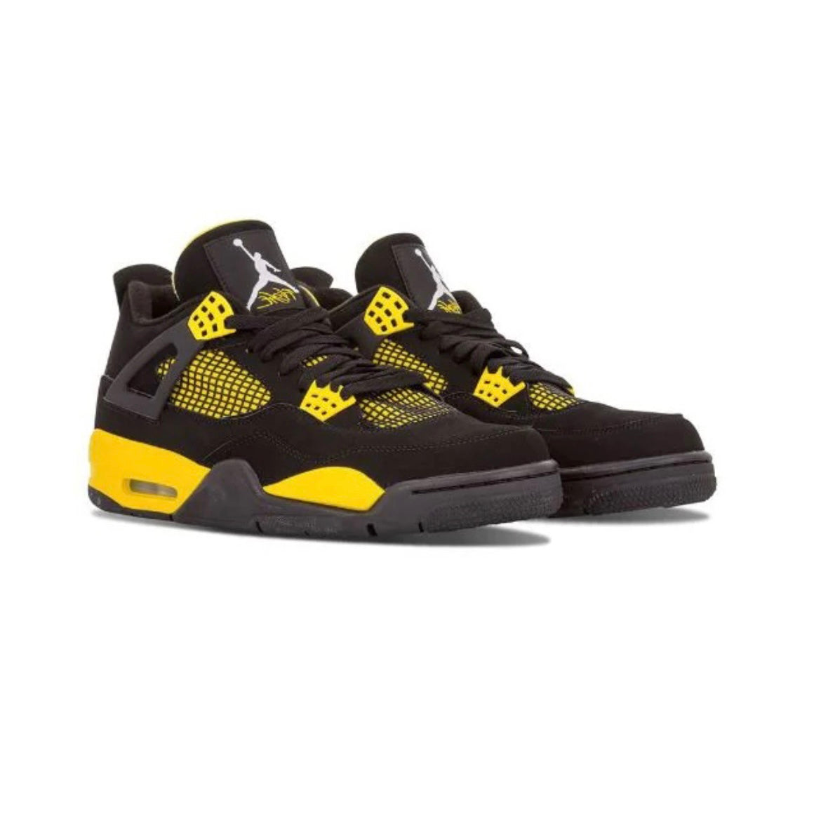 Air Jordan 4 Thunder baskets homme et femme en cuir noir jaune, détail semelle