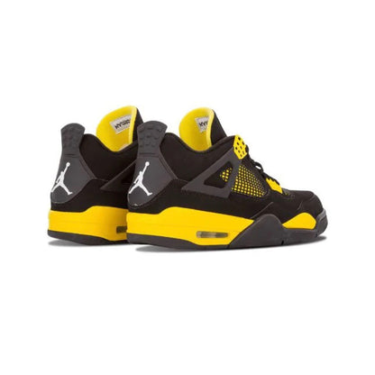 Air Jordan 4 Thunder baskets homme et femme en cuir noir jaune, vue de face