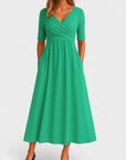 Robe Midi Élégante Femme à Col V – Manches Courtes Taille Définie