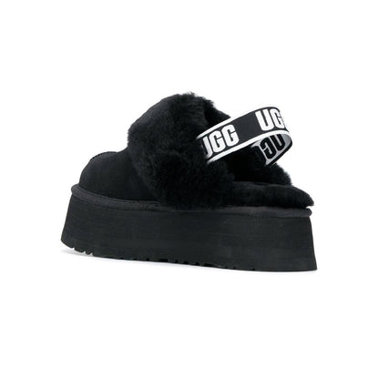 UGG Funkette Plateforme Black sabots à plateforme femme en daim et peau de mouton noir, détail semelle