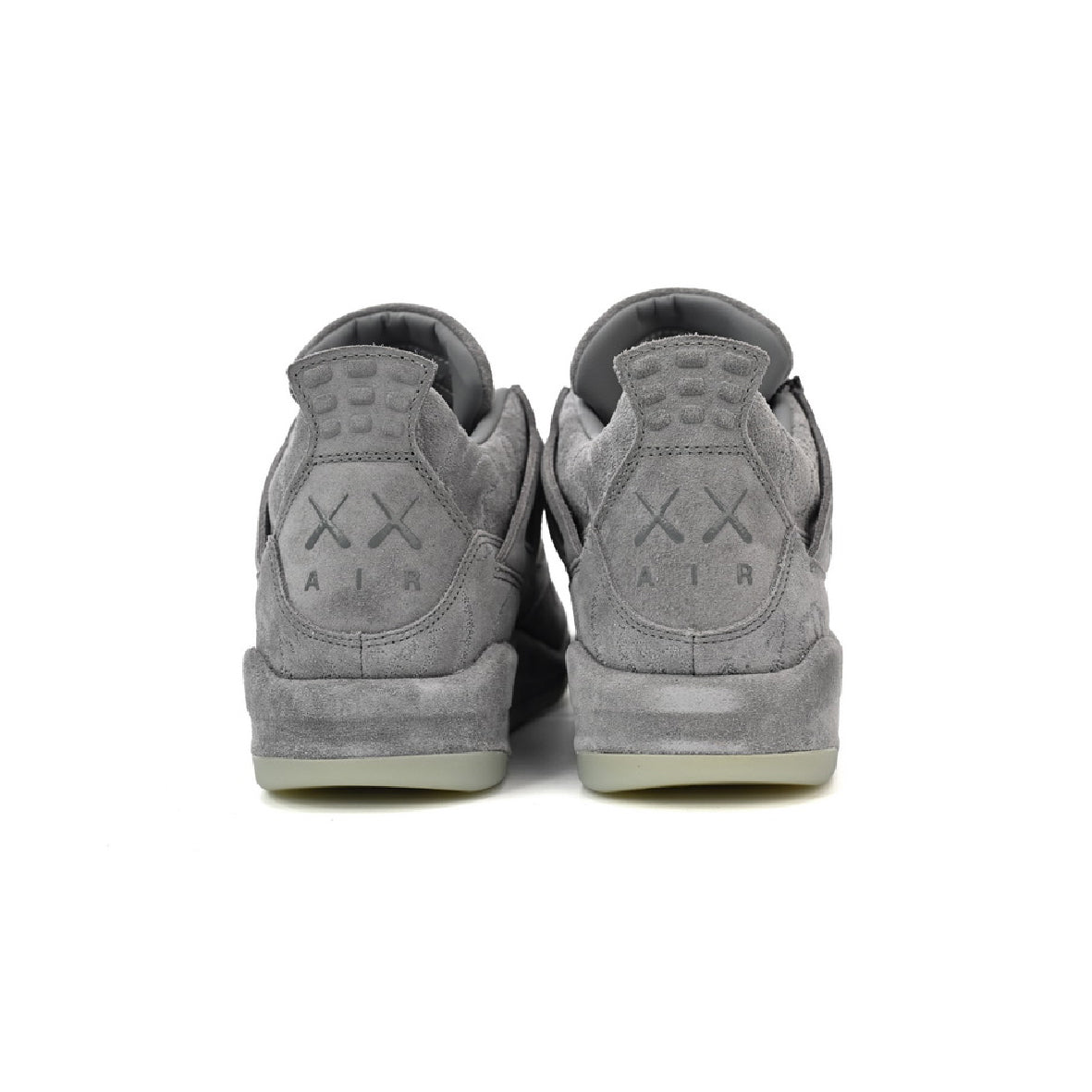 Air Jordan 4 Kaws baskets homme et femme en cuir gris, détail semelle