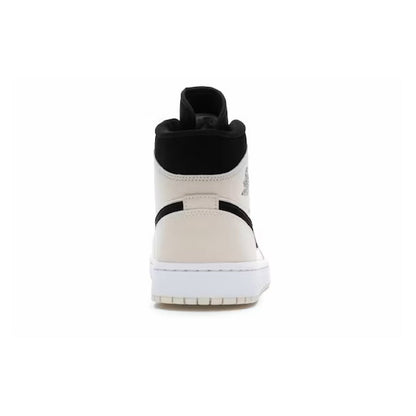 Air Jordan 1 Mid Barely Orange baskets mi-montantes homme et femme en cuir orange, détail semelle