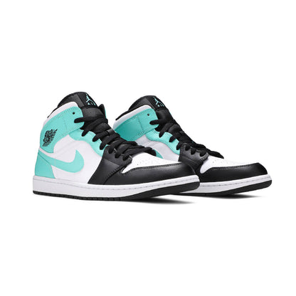 Air Jordan 1 Mid Tropical Twist baskets mi-montantes homme et femme en cuir noir bleu, vue de face