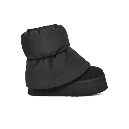UGG Mini Dipper Puffer Black bottines fourrées femme en nylon matelassé et peau de mouton naturelle noir, vue de profil