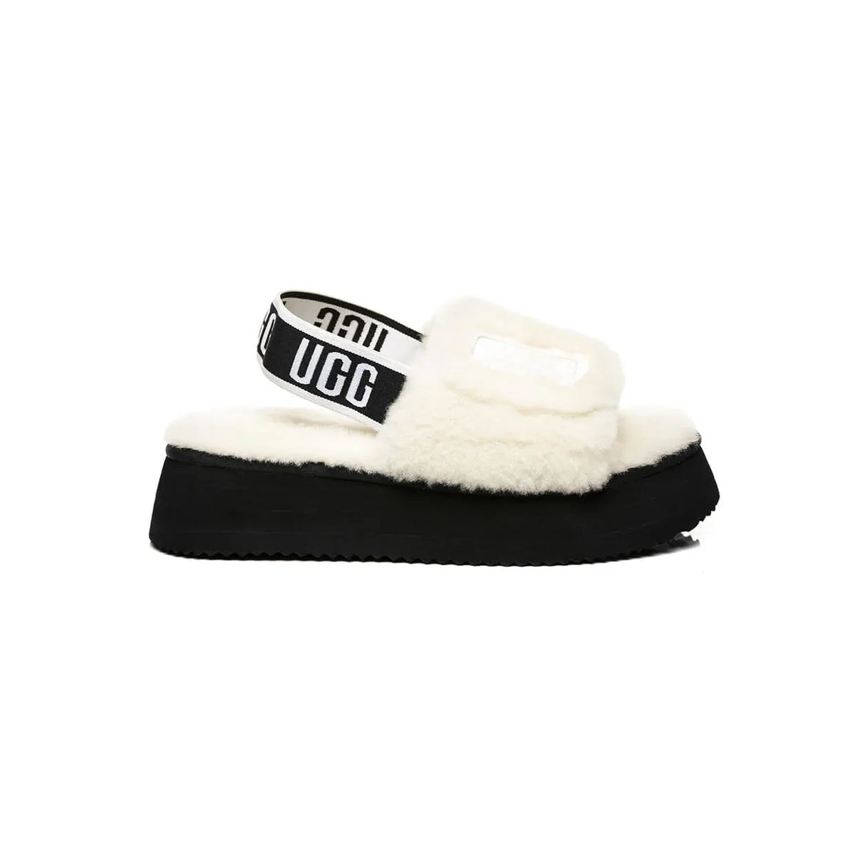 UGG Disco Slide White Black claquettes fourrées femme en peau de mouton naturelle blanc et noir, vue de profil