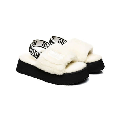 UGG Disco Slide White Black claquettes fourrées femme en peau de mouton naturelle blanc et noir, vue de face