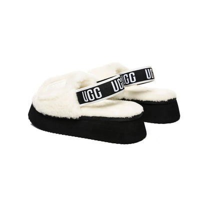 UGG Disco Slide White Black claquettes fourrées femme en peau de mouton naturelle blanc et noir, détail semelle